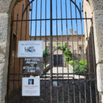 Beware of the dog at the entrance to the castle