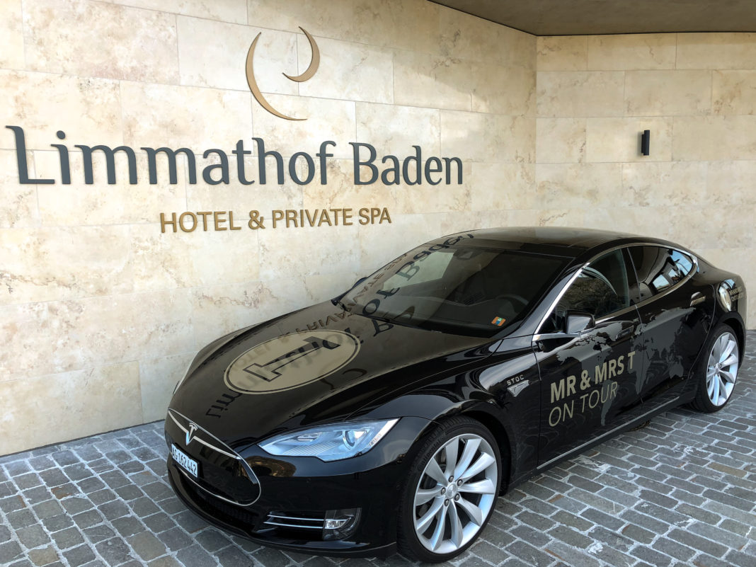 Mr and Mrs T Model S in front of hotel Limmathof